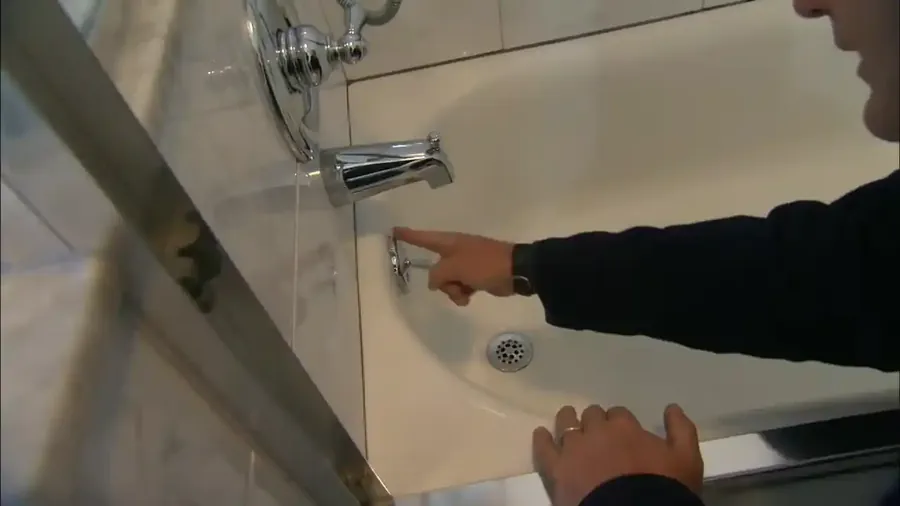Bathtub overflow and drain shoe leak test in a Tyler TX two-story home