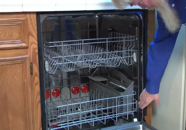 Dishwasher supply and drain leak causing floor damage in a Tyler TX kitchen