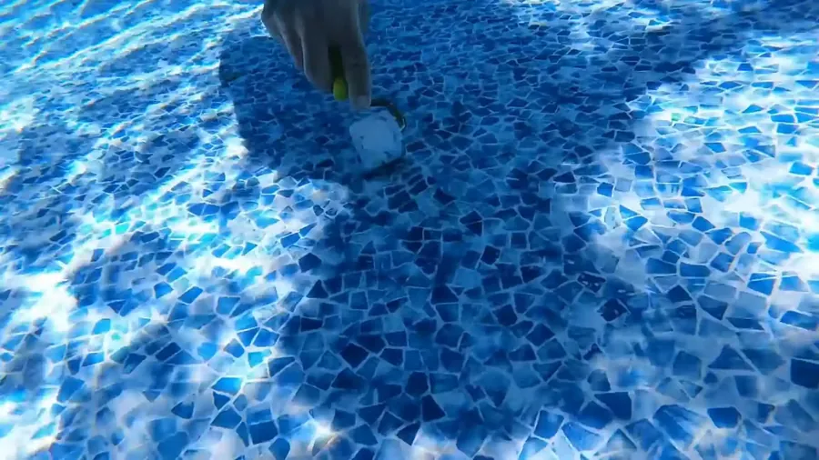 Pool leak detection with dye testing at a Tyler TX backyard pool