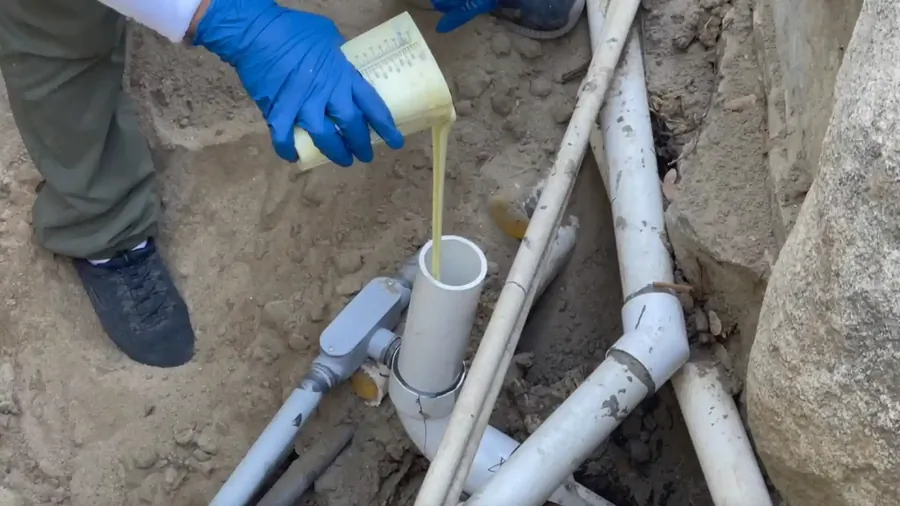 Trenchless pipe lining equipment protecting a Tyler TX yard from open excavation